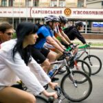 group of people riding a bicycles