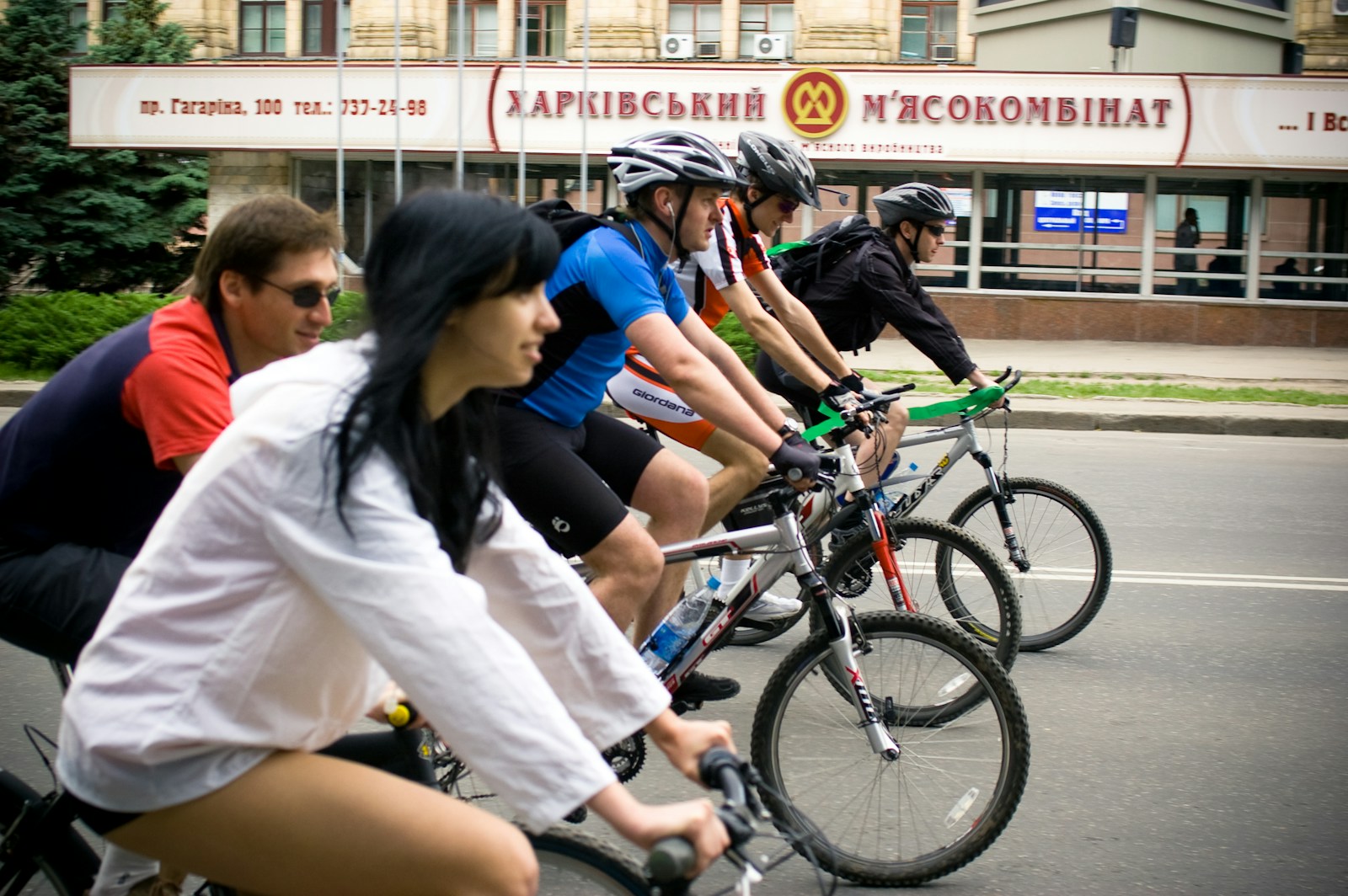 group of people riding a bicycles